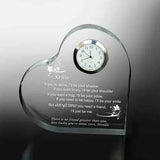 Acrylic heartshaped keepsake gift with a clock and printed message.