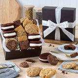 Gift box filled with gourmet cookies and more and tied with thank you printed ribbon