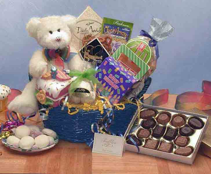 Happy Birthday gift basket with teddy bear, chocolates, and other treats