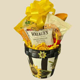 Sunflower themed flower pot filled with snacks and topped with a yellow bow