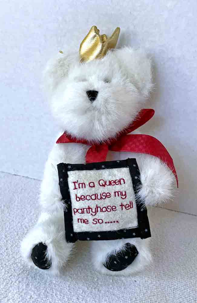 cuddly white teddy bear with crown and sign "I'm a queen because my pantyhose tells me so...."